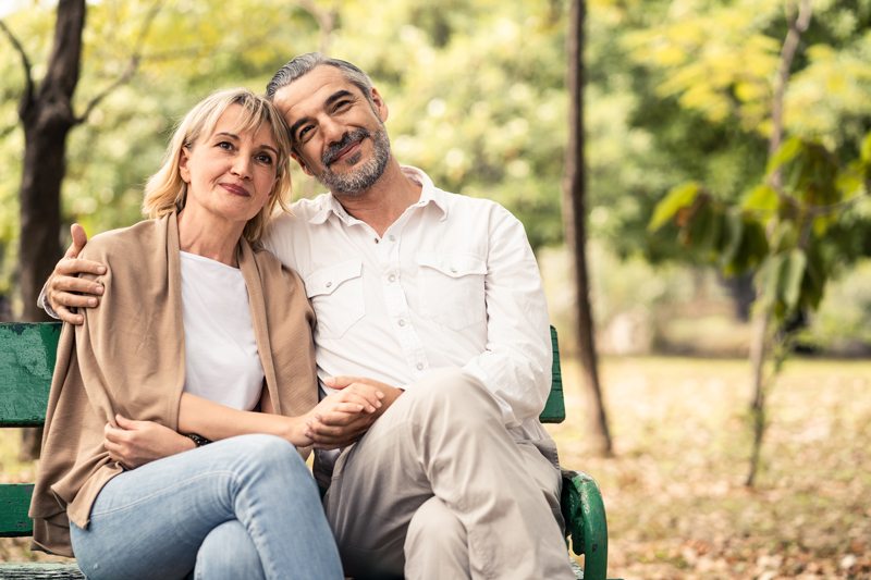 benefits-bhrt-ottawa-bioidentical-hormone-doctors Couple sitting on a bench in Ottawa enjoying the benefits of BHRT
