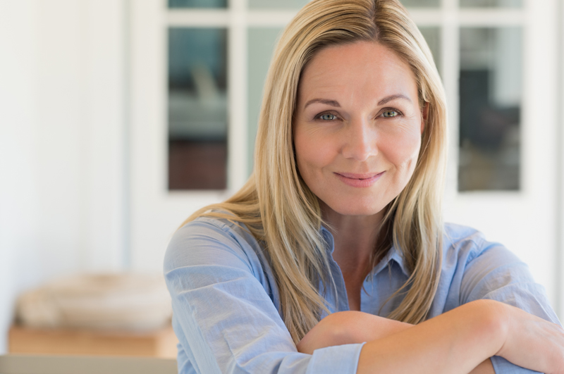 Ottawa-bioidentical-hormone-doctors-women-female-menopause Middle age menopausal woman smiling at camera